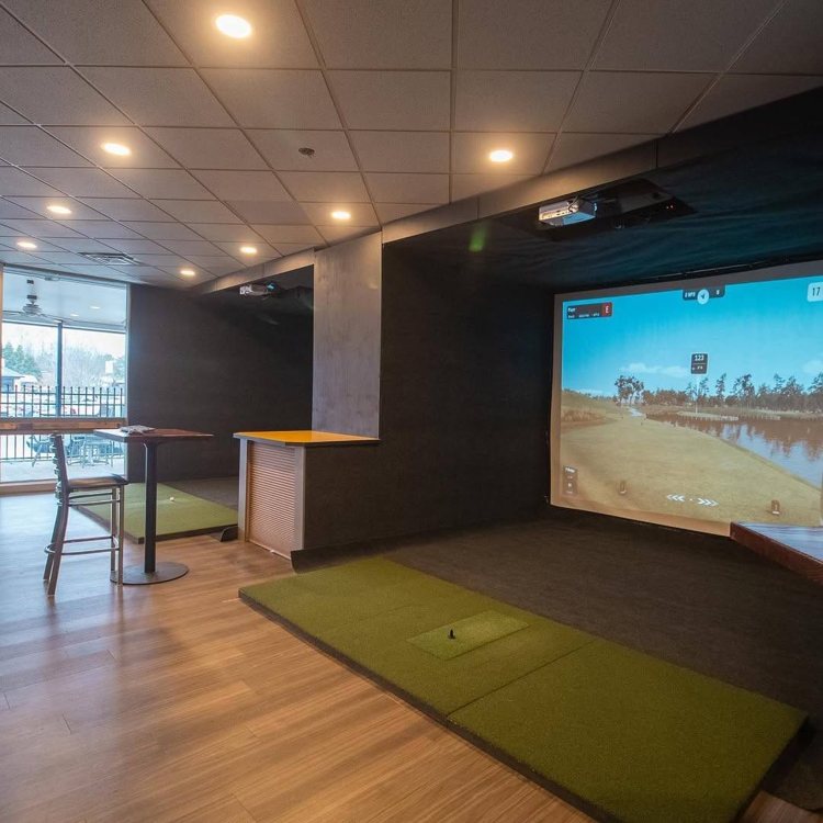 Finished indoor golf simulator enclosure at Southland Lanes